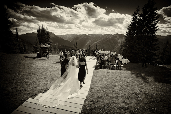 bride walking down the isle - wedding photo by top Denver based wedding photographer Hardy Klahold